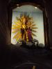 Socha Panny Marie vykukuje z pod igelitu, kterým je přikryt hlavní oltář.